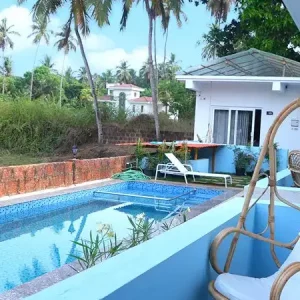 Pool View Resort near Morjim – White Flower